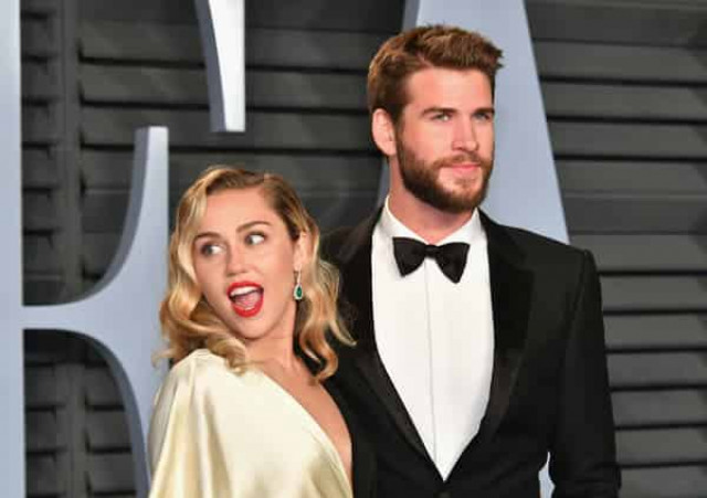Miley Cyrus breaks up with Liam Hemsworth, spotted kissing girl