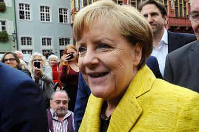 В Германии разберутся с попыткой нападения старушки с зонтиком на Меркель