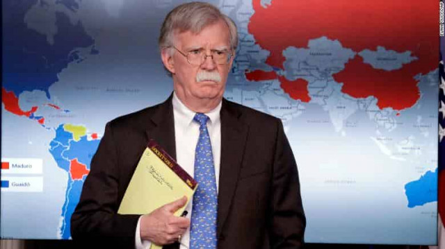 White House not tamping down tensions after Bolton seen holding notepad with words '5000 troops to Colombia'