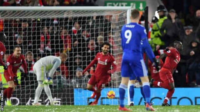 Liverpool held but go five points clear
